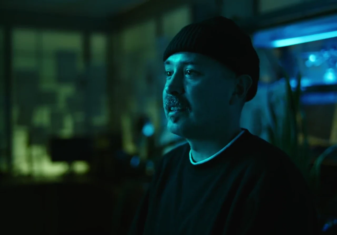 A portrait in the blue-lit Liquid Max studio