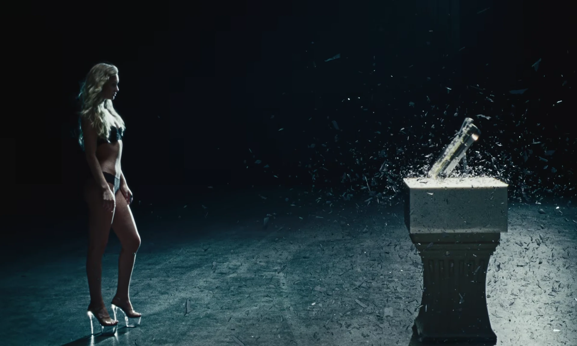 The shattered speaker on the illuminated stage